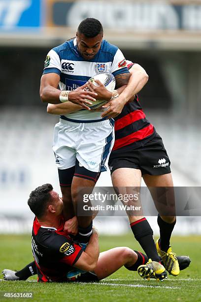 Lolagi Visinia of Auckland is tackled by Ryan Crotty of Canterbury during the round three ITM Cup match between Auckland and Canterbury at Eden Park...