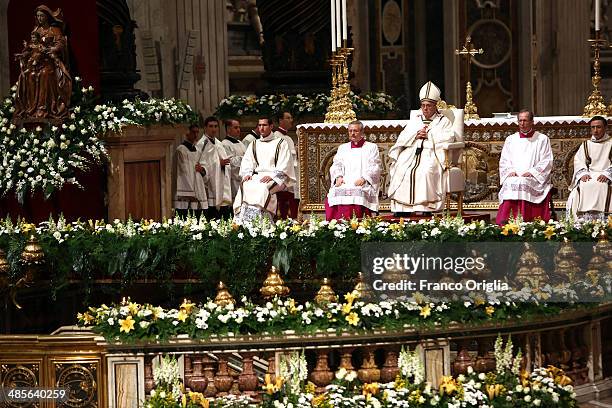 Pope Francis attends the Holy Saturday Easter vigil mass at St. Peter's Basilica on April 19, 2014 in Vatican City, Vatican. The Pope will lead...