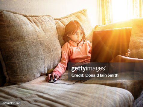 Girl using laptop computer Girl using laptop computer