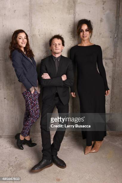 Actors Olivia Thirlby, Anton Yelchin and Berenice Marlohe from "5 to 7" pose for the 2014 Tribeca Film Festival Getty Images Studio on April 19, 2014...