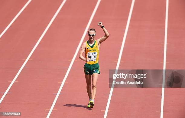 Silver medalist Jared Tallent of Australia celebrates as he arrives finish line in the Men's 50km Race Walk during the '15th IAAF World Athletics...