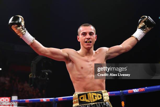 Scott Quigg celebrates after knocking out Tshifhiwa Munyai during the WBA World Super Bantamweight Title fight between Scott Quigg and Tshifhiwa...