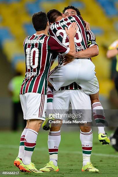 Wagner, Rafael Sobis and Fred of Fluminense celebrate a scored goal against Figueirense during a match between Fluminense and Figueirense as part of...