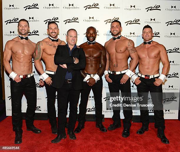 James Davis, Mikey Perez, Michael Caprio, Tyson Beckford, Matt Marshall and Nathan Minor pose for photos on Tyson Beckford's opening night with...