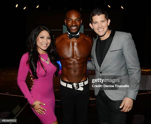 Jasmine Trias, Tyson Beckford and Ben Stone pose for a photo on Tyson Beckford's opening night with Chippendales at Rio All-Suite Hotel & Casino on...