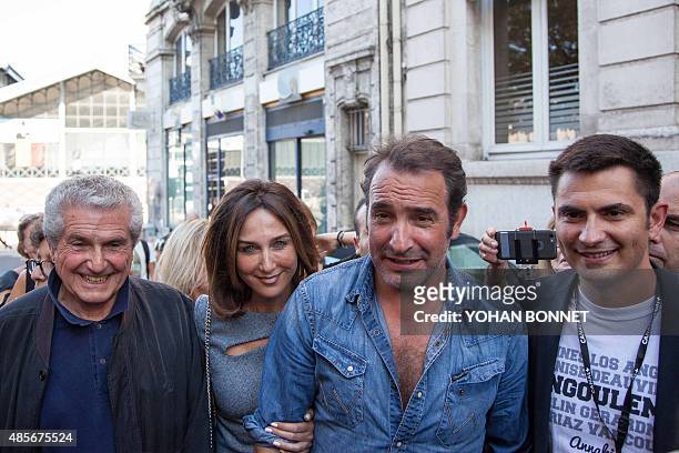 French director Claude Lelouch, French actors Elsa Zylberstein and Jean Dujardin and Mayor of Angouleme Xavier Bonnefont attend the inauguration of a...