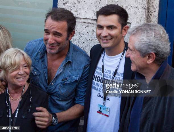French director Marie-France Briere, French actor Jean Dujardin, Mayor of Angouleme Xavier Bonnefont and French director Claude Lelouch attend the...