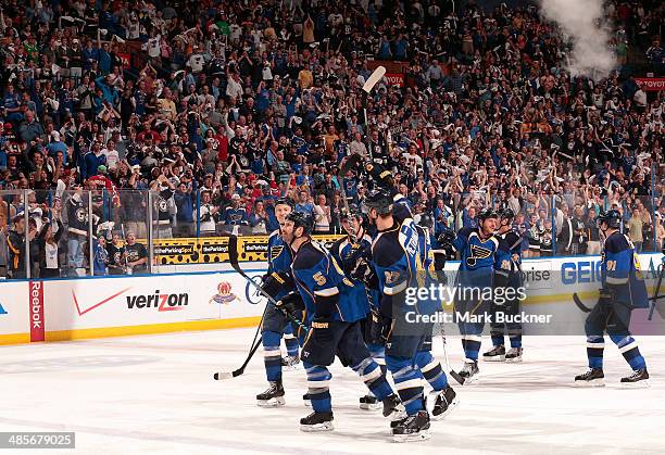 Barret Jackman of the St. Louis Blues looks on as fans celebrate his game winning goal against the Chicago Blackhawks in Game Two of the First Round...