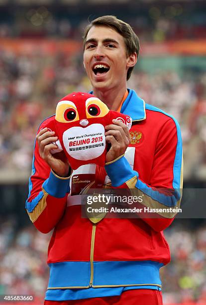 Gold medalist Sergey Shubenkov of Russia poses on the podium during the medal ceremony for the Men's 110 metres hurdles final during day eight of the...