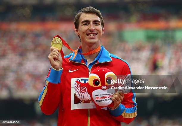 Gold medalist Sergey Shubenkov of Russia poses on the podium during the medal ceremony for the Men's 110 metres hurdles final during day eight of the...