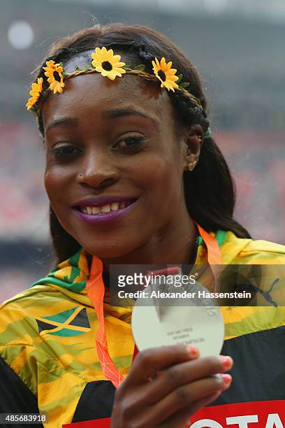 Silver medalist Elaine Thompson of Jamaica poses on the podium during the medal ceremony for the Women's 200 metres final during day eight of the...