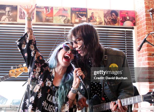 Alexandra Starlight and guitarist Chris Honetschlaeger of Alexandra & The Starlight Band celebrate "Record Store Day" with special vinyl record...