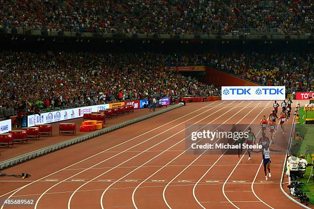 Mohamed Farah of Great Britain crosses the finish line to win gold in the Men's 5000 metres final during day eight of the 15th IAAF World Athletics...