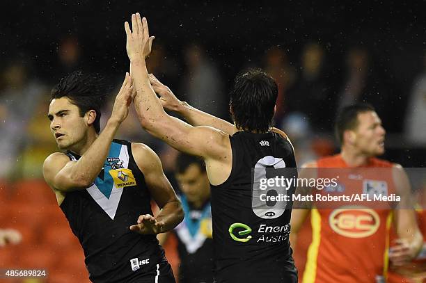 Chad Wingard of the Power celebrates kicking a goal during the round 22 AFL match between the Gold Coast Suns and the Port Adelaide Power at Metricon...