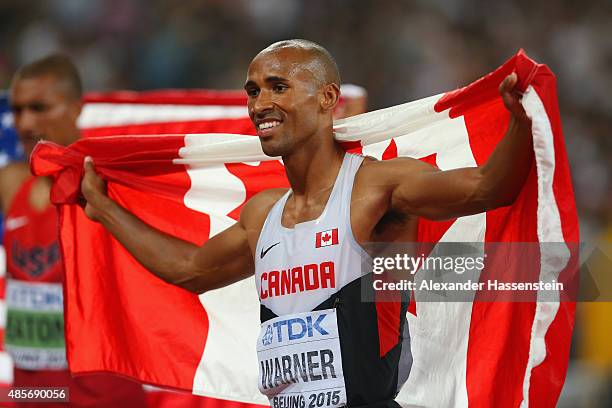 Silver medalist Damian Warner of Canada celebrates after the Men's Decathlon 1500 metres heat 2 during day eight of the 15th IAAF World Athletics...