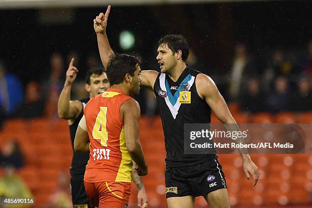 Patrick Ryder of the Power celebrates kicking a goal during the round 22 AFL match between the Gold Coast Suns and the Port Adelaide Power at...