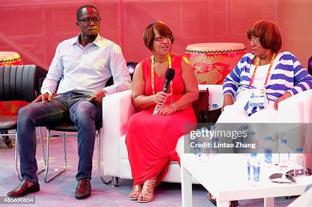 Dwight Phillips , Donna Prather Williams and Beverly Owens Prather on stage as Jesse Owens' daughter and granddaughter talk about RACE, a forthcoming...