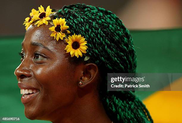 Shelly-Ann Fraser-Pryce of Jamaica celebrates after crossing the finish line to win gold in the Women's 4x100 Metres Relay final during day eight of...