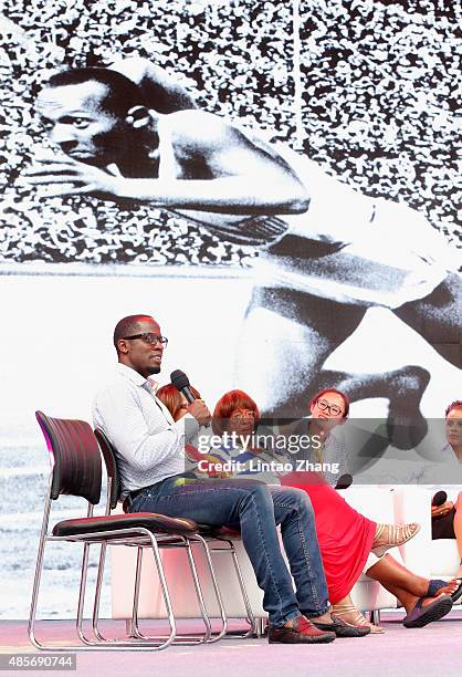 Dwight Phillips , Donna Prather Williams , Beverly Owens Prather , Joanna Hayes on stage as Jesse Owens' daughter and granddaughter talk about RACE,...