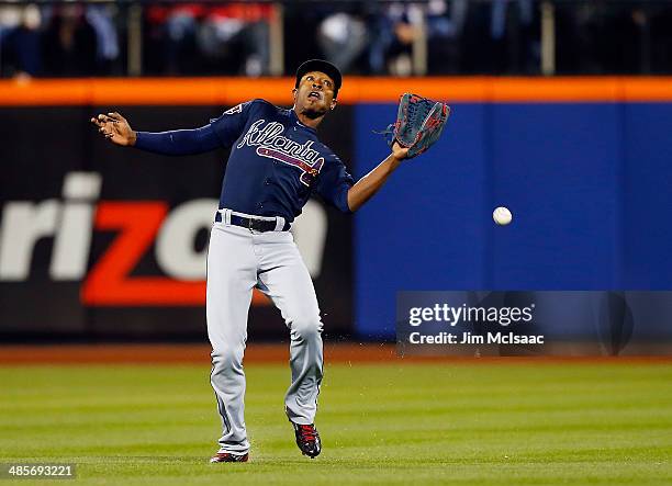 Upton of the Atlanta Braves misses a ball hit by Curtis Granderson of the New York Mets in the sixth inning at Citi Field on April 19, 2014 in the...