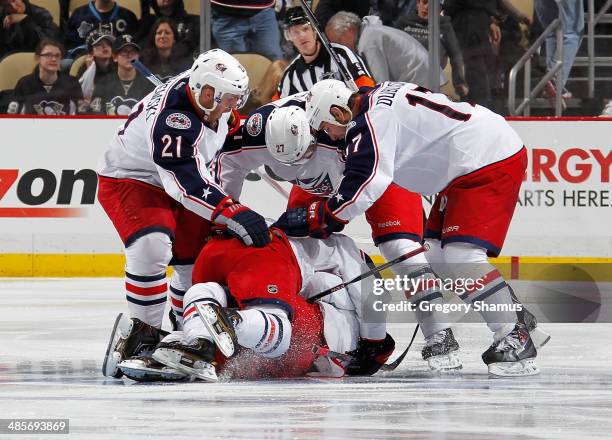 Matt Calvert of the Columbus Blue Jackets is congratulated by teammates after his game winning-goal against the Pittsburgh Penguins in Game Two of...