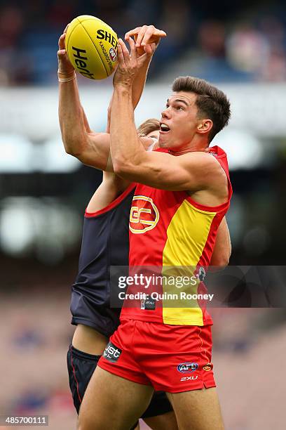 Jaeger O'Meara of the Suns marks during the round five AFL match between the Melbourne Demons and the Gold Coast Suns at Melbourne Cricket Ground on...