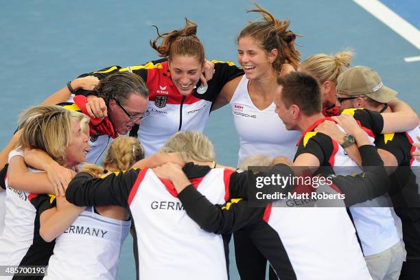 Anna Petkovic and Julia Goerges of Germany celebrate victory with team-mates during the Fed Cup Semi Final tie between Australia and Germany at Pat...