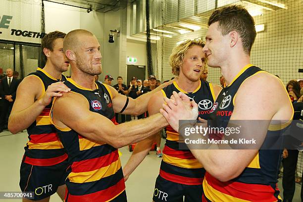 Scott Thompson of the Crows celebrates with teammate Patrick Dangerfield after the round five AFL match between the Adelaide Crows and the Greater...