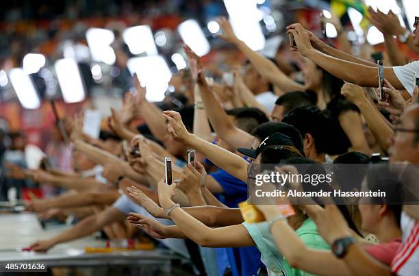 Athletics fans soak up the aatmosphere during day eight of the 15th IAAF World Athletics Championships Beijing 2015 at Beijing National Stadium on...