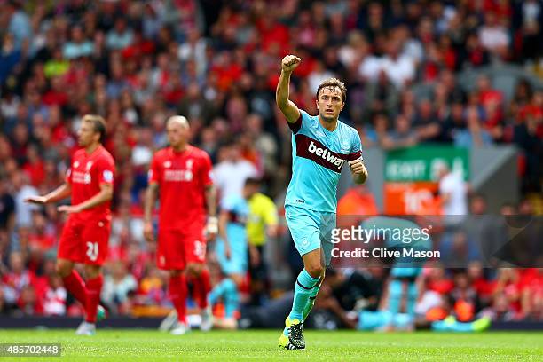 Mark Noble of West Ham United celebrates scoring his team's second goal from the penalty spot during the Barclays Premier League match between...