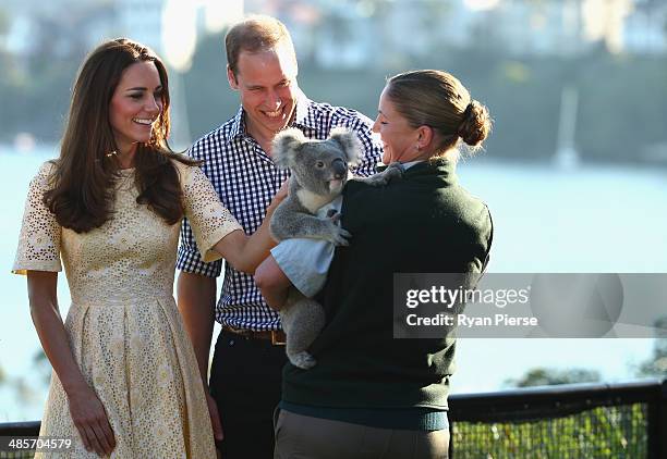 Prince William, Duke of Cambridge, and Catherine, Duchess of Cambridge, meet a Koala at Taronga Zoo on April 20, 2014 in Sydney, Australia. The Duke...