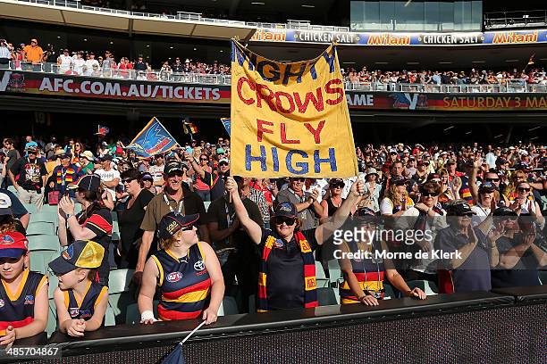 Spectators enjoy the atmosphere during the round five AFL match between the Adelaide Crows and the Greater Western Sydney Giants at Adelaide Oval on...