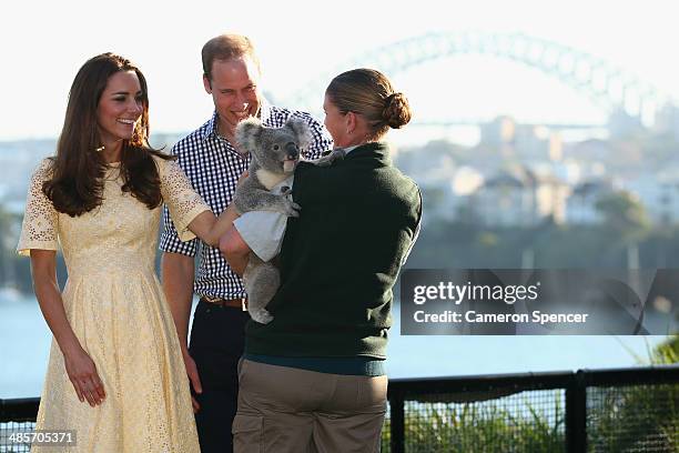 Catherine, Duchess of Cambridge, and Prince William, Duke of Cambridge meet a Koala at Taronga Zoo on April 20, 2014 in Sydney, Australia. The Duke...