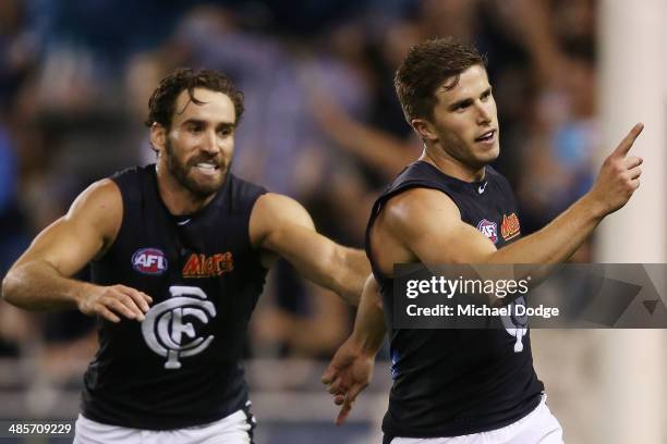 Marc Murphy of the Blues celebrates a goal with Andrew Walker during the round five AFL match between the Western Bulldogs and the Carlton Blues at...