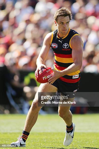 Brodie Smith of the Crows runs with the ball during the round five AFL match between the Adelaide Crows and the Greater Western Sydney Giants at...