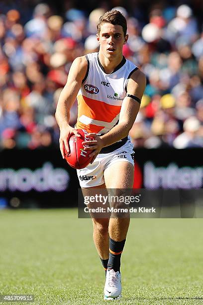 Joshua Kelly of the Giants runs with the ball during the round five AFL match between the Adelaide Crows and the Greater Western Sydney Giants at...