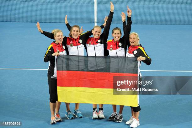 Angelique Kerber, Andrea Petkovic, Anna-Lena Groenefeld, Julia Goerges and Barbara Rittner pose for a photograph after during the Fed Cup Semi Final...