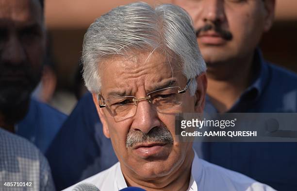 Pakistani Defence Minister Khawaja Asif speaks with media after meeting with patients, who were injured during cross-border shelling, at a military...