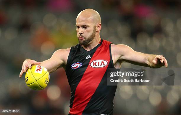 Paul Chapman of the Essendon Bombers kicks the ball during the round 22 AFL match between the Essendon Bombers and the Richmond Tigers at Melbourne...