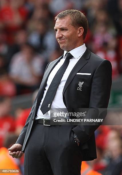 Liverpool's Northern Irish manager Brendan Rodgers gestures during the English Premier League football match between Liverpool and West Ham at the...