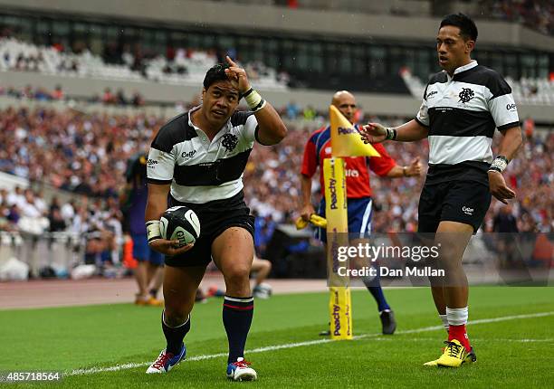 Ben Tapuai of The Barbarians celebrates after scoring a try during the International Friendly match between The Barbarians and Samoa at Olympic...