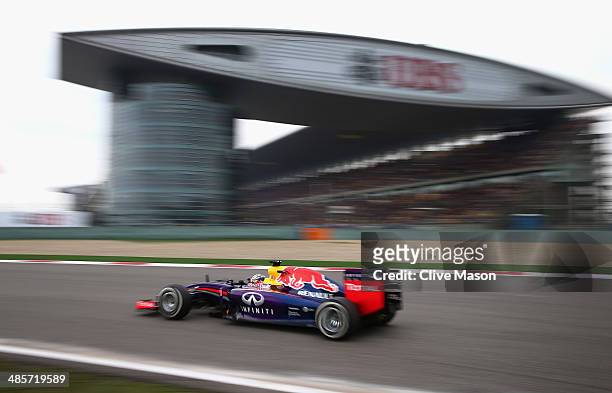 Sebastian Vettel of Germany and Infiniti Red Bull Racing drives during the Chinese Formula One Grand Prix at the Shanghai International Circuit on...