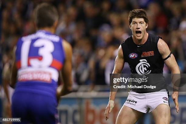 Sam Rowe of the Blues tries to distract Daniel Giansiracusa of the Bulldogs during the round five AFL match between the Western Bulldogs and the...