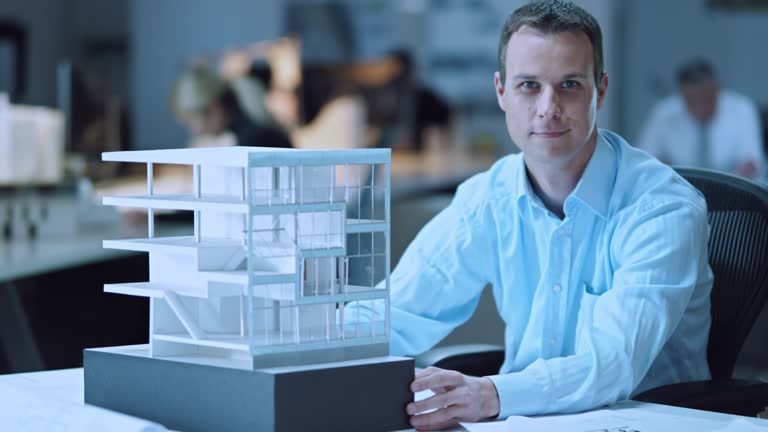 https://media.gettyimages.com/id/485722610/video/portrait-of-architect-checking-the-architectural-model.jpg?b=1&s=640x640&k=20&c=btynRTBkkCL78ccoJ7Ml_Pu2Fkz5T2T1VZmlznnairM=