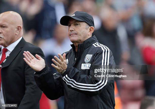 Tony Pulis manager of West Bromwich Albion leaves the pitch at the end of the game during the Barclays Premier League match between Stoke City and...