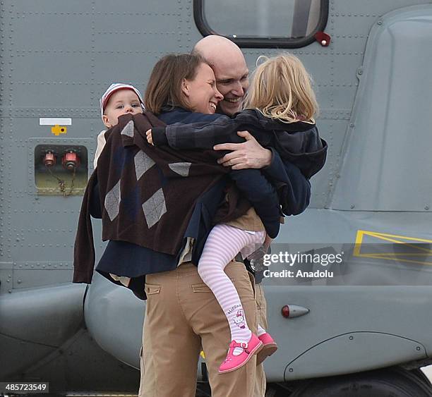 Nicolas Henin , released French hostages is welcomed upon their arrival at the Villacoublay military airbase on April 20, 2014 in Paris, France. Four...