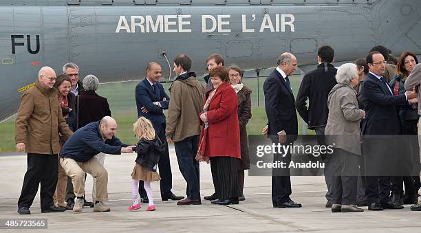 Nicolas Henin , released French hostages is welcomed upon their arrival at the Villacoublay military airbase on April 20, 2014 in Paris, France. Four...