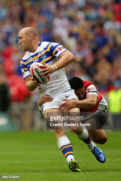 Carl Ablett of Leeds Rhinos survives a tackl from Hull KR during the Ladbrokes Challenge Cup Final between Leeds Rhinos and Hull KR at Wembley...