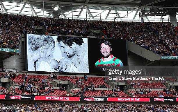 Tribute to Rugby League player Danny Jones appears on the giant screen prior to the Ladbrokes Challenge Cup Final at Wembley Stadium on August 29,...