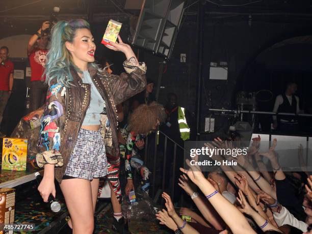 Asami Zdrenka of Neon Jungle hands out Easter eggs at Heaven at G-A-Y on April 19, 2014 in London, England.